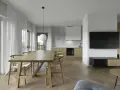 Nowoczesny pokój dzienny inspiracje: drewniany stół, krzesła, kuchnia i salon z TV.