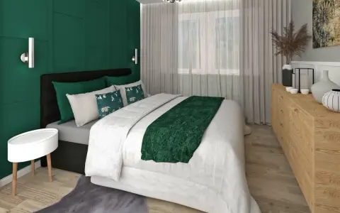 Elegancka sypialnia w butelkowej zieleni i szarości. Ściana za łóżkiem w głębokim odcieniu zieleni, z geometrycznymi panelami. Pościel biała, z zielonym akcentem.