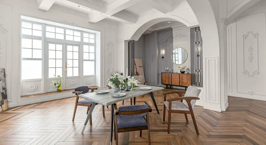 Elegancki salon z jadalnią, łuk wykończony sztukaterią, drewniana podłoga w jodełkę.