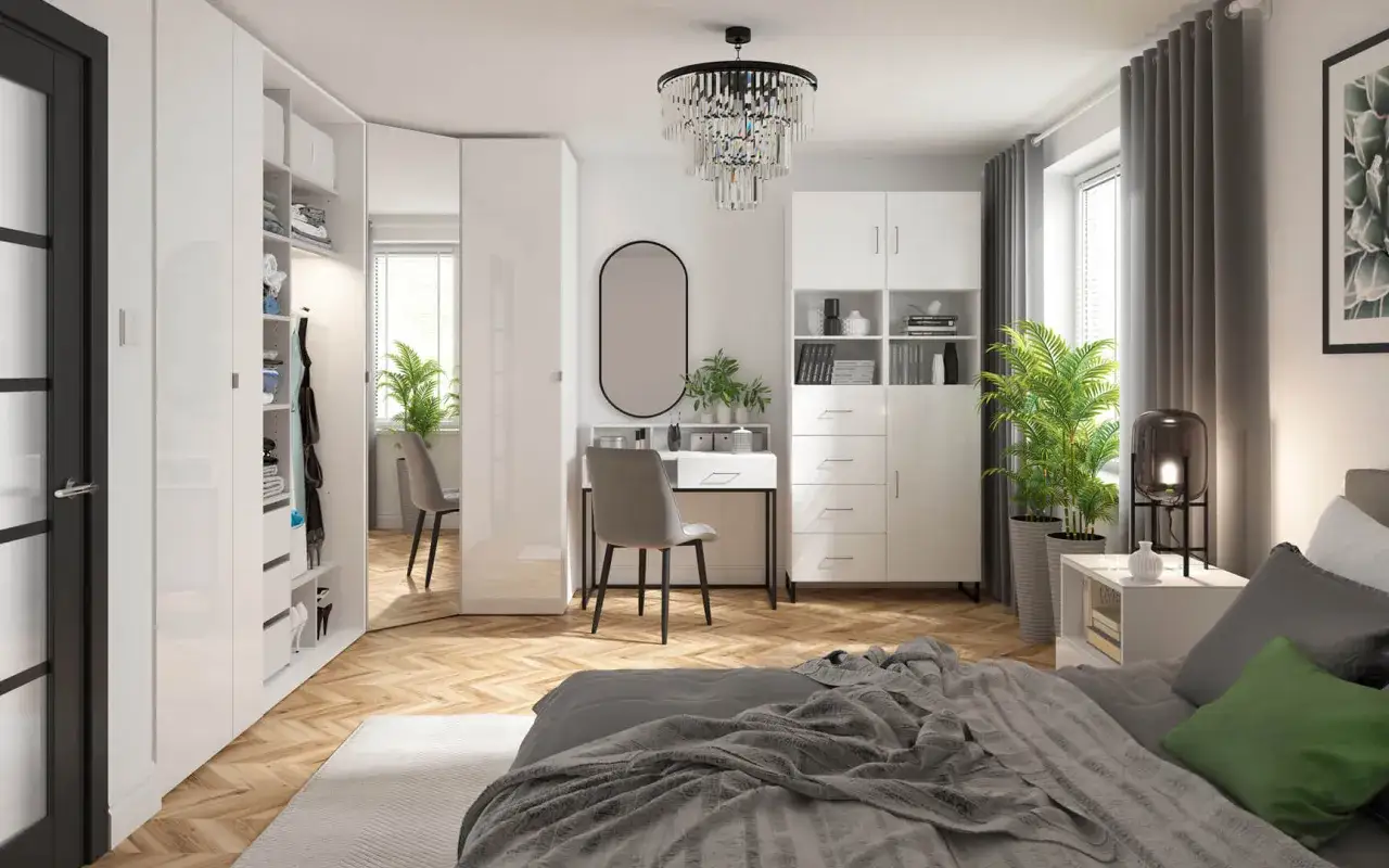 Nowoczesna sypialnia z lustrzaną szafą, biurkiem i designerską lampą. Jaka lampa do sypialni? Ta szklana lampka nocna dodaje elegancji.